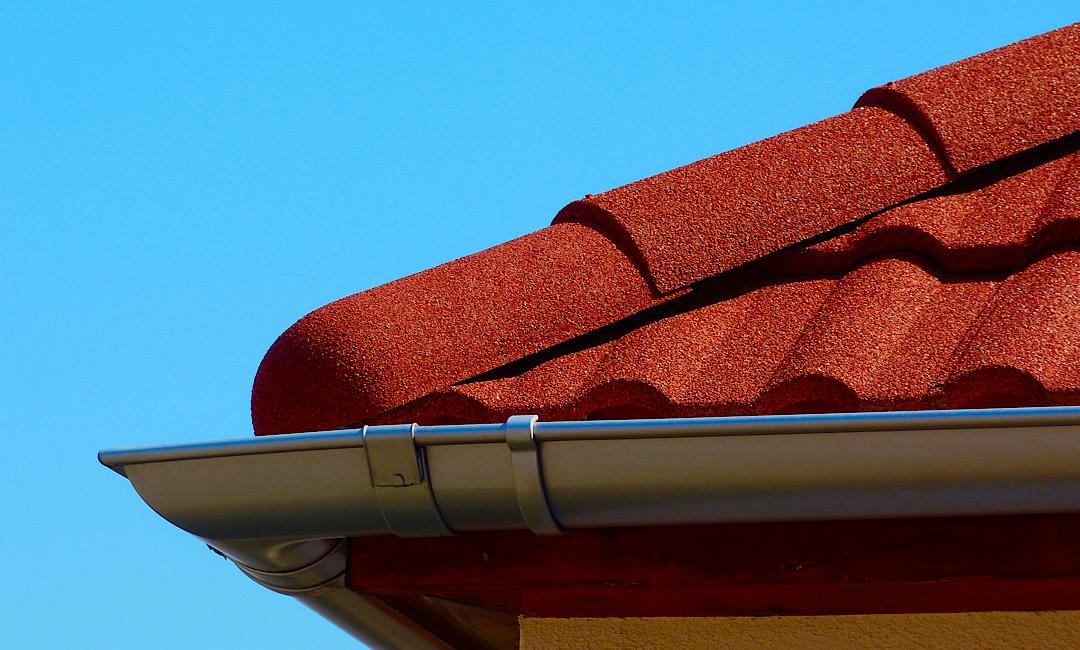 k style vs half round gutters texas